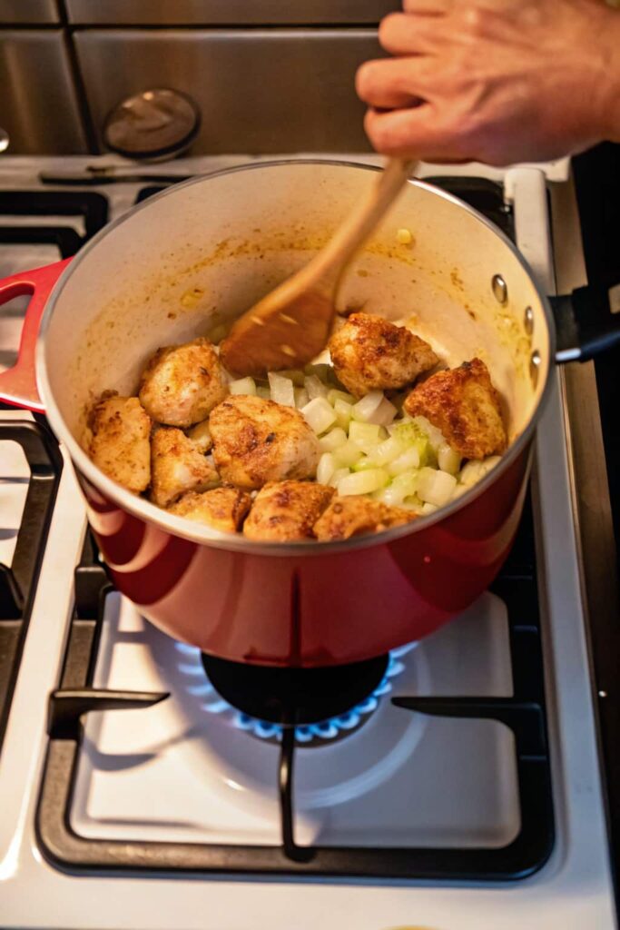 add chicken to the pot