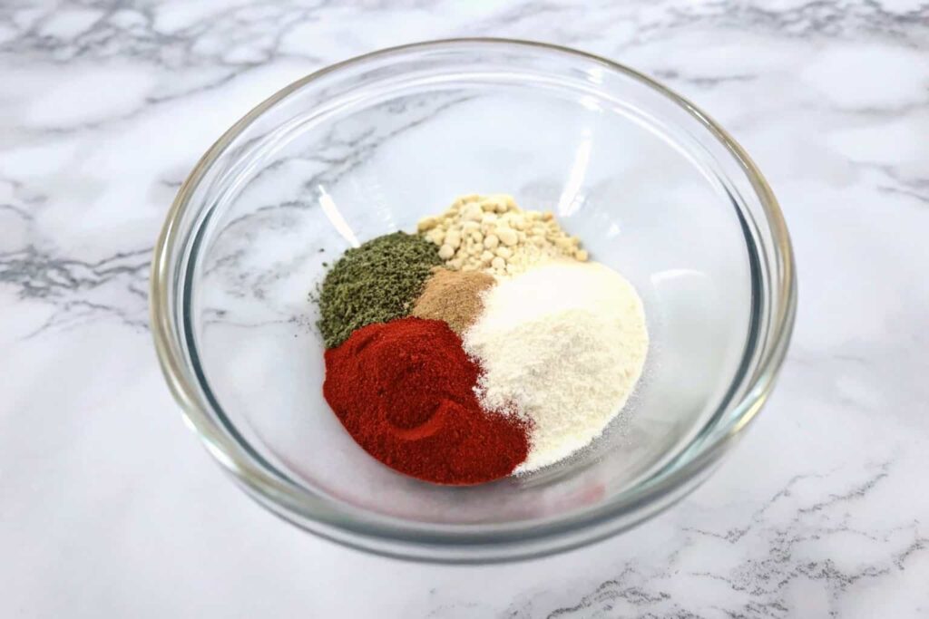 Aromatic spices neatly arranged before cooking
