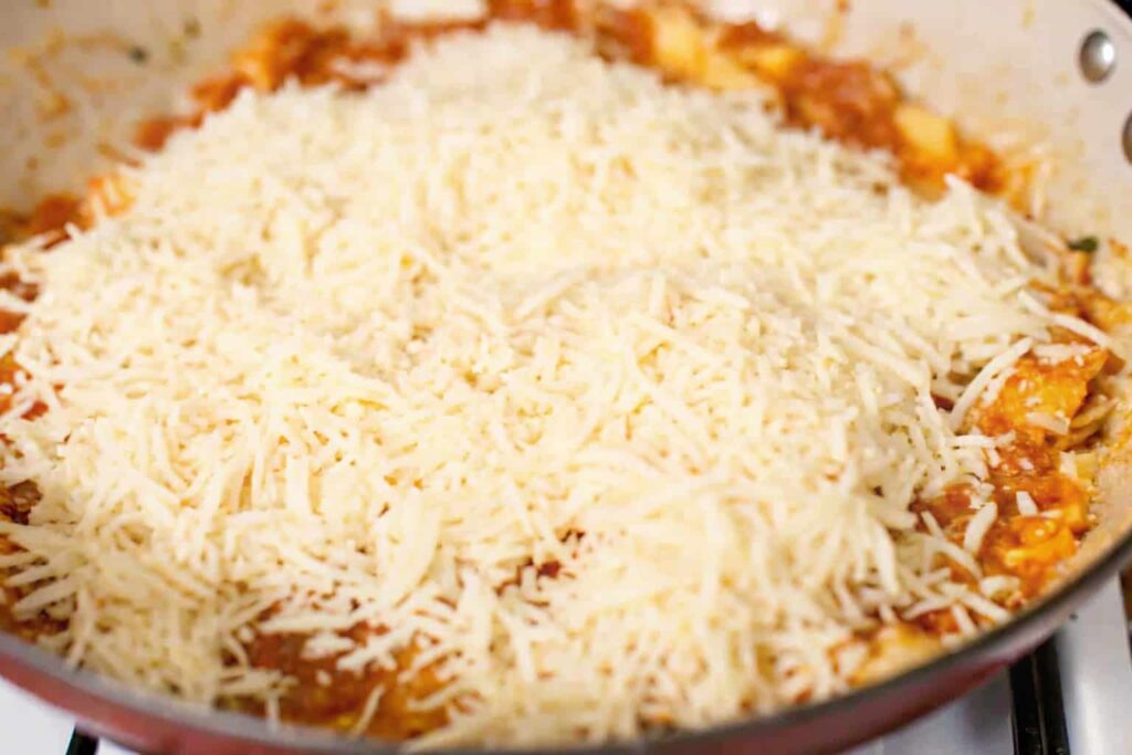 Adding rice to the sautéed onions